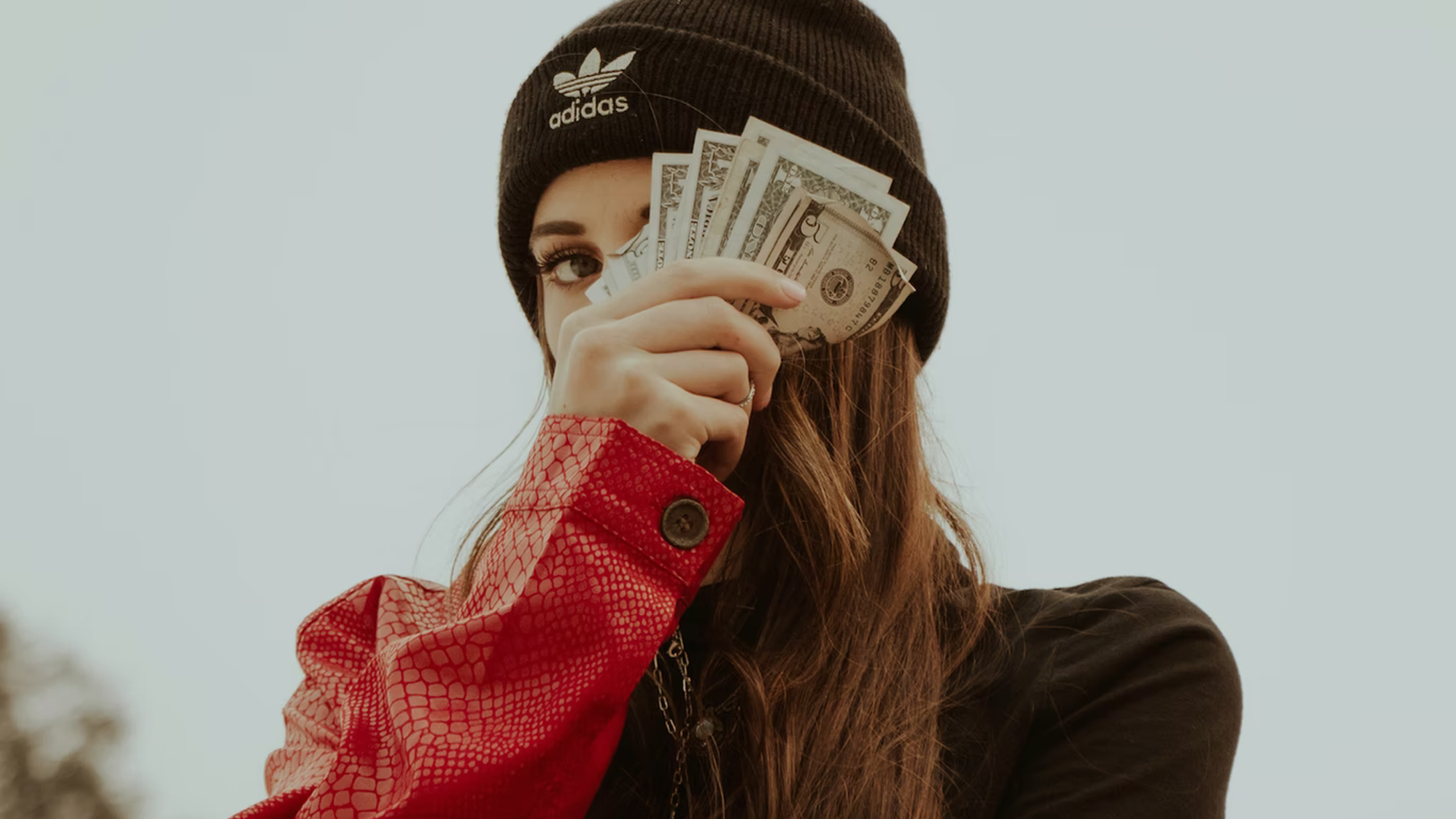 A girl holding money